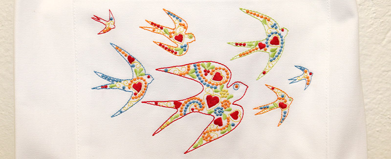 Schwalbenmotiv Schürze